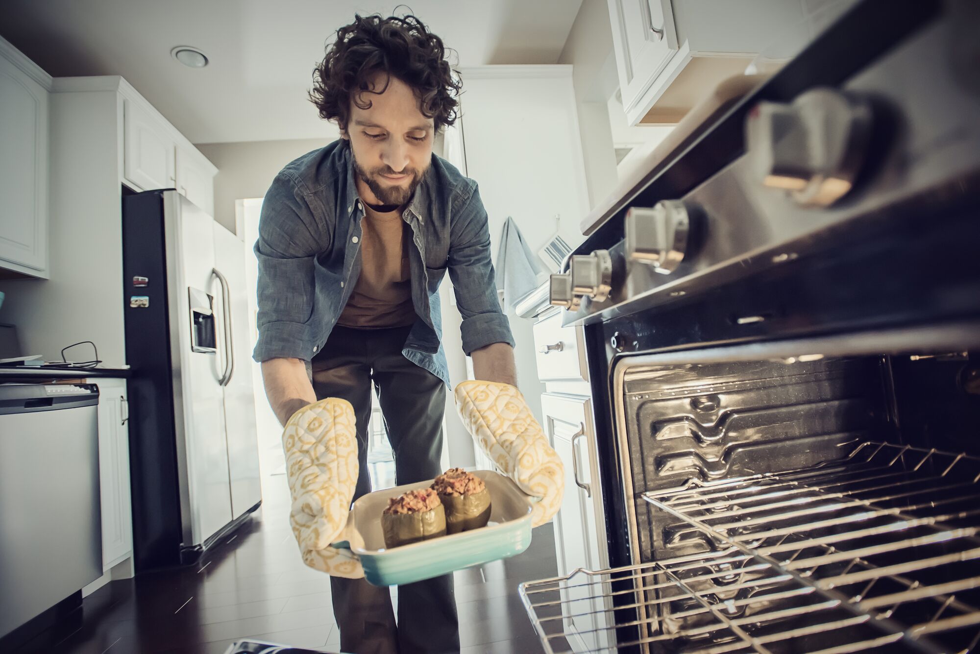 Man cooking with oven