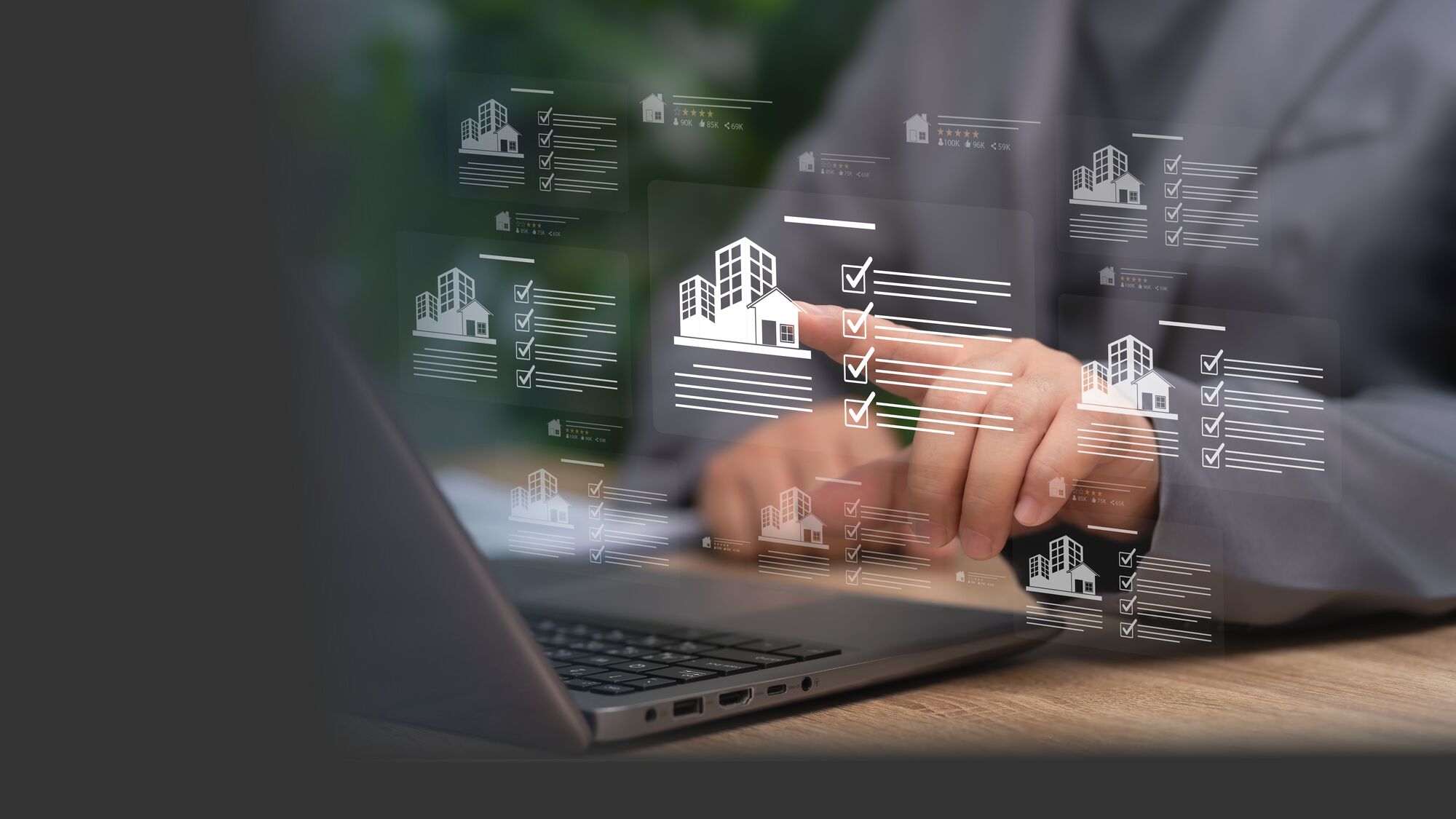 A rental property operator reviews portfolio performance on a laptop