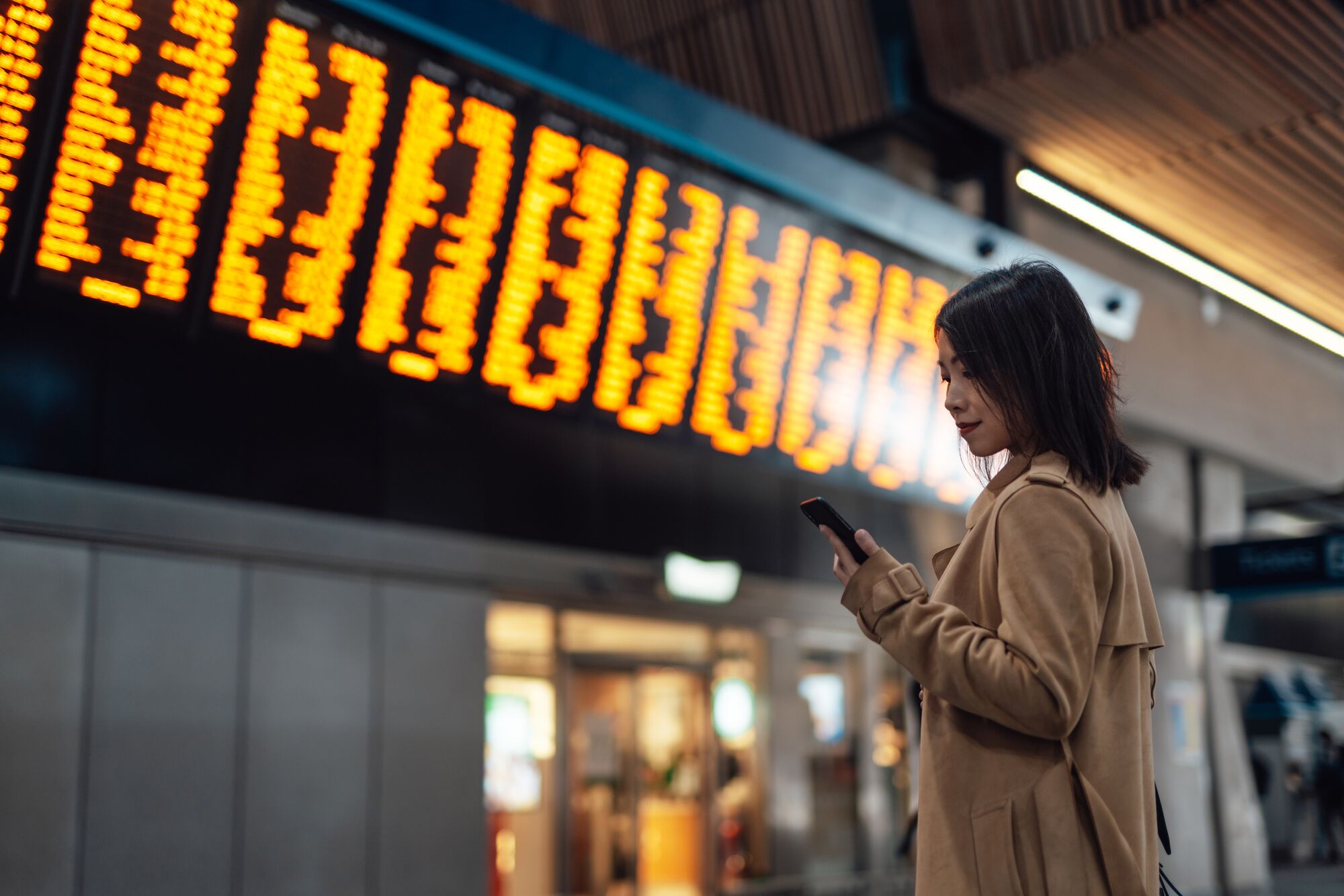Young Asian woman on business trip. Business commuter. Business on the go concept.