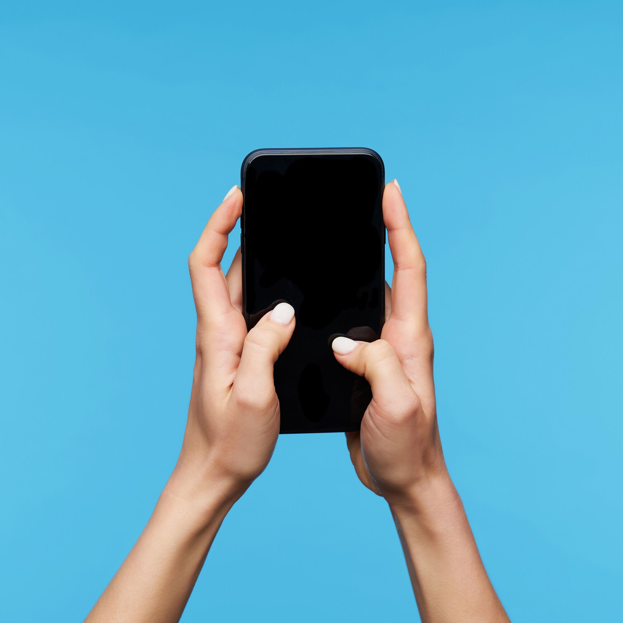 AdobeStock_333852918x_phone in hands_1x1